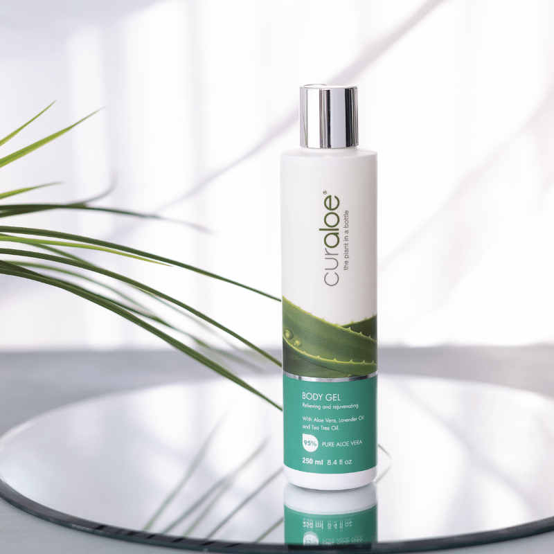 Curalee body gel bottle with aloe vera on a white background